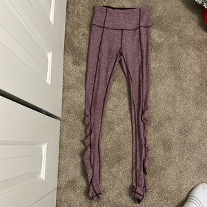 Lululemon light washed ribbed purple leggings.